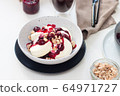 Cottage cheese pancakes with berry sauce and nuts. Healthy breakfast concept. 64971727