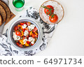 Healthy salad with grilled pepper, tomatoes, stracciatella, herbs and pumpkin seeds. Healthy eating concept. 64971734