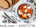 Healthy salad with grilled pepper, tomatoes, stracciatella, herbs and pumpkin seeds. Healthy eating concept. 64971736