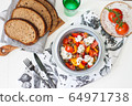 Healthy salad with grilled pepper, tomatoes, stracciatella, herbs and pumpkin seeds. Healthy eating concept. 64971738