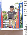 Children playing in the park 64974376