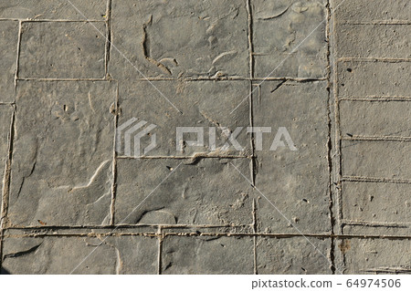 Stamped concrete slate end pattern, expansion joint on the right and down movement, pavement outdoor with decorative appearance colors textures of paving stone tile Stamped concrete slate end pattern, expansion joint on the right and down movement, pavement outdoor with decorative appearance colors textures of paving stone tile 64974506