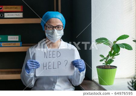 Female Doctor Offers Help Showing Inscription On Paper Female Doctor Offers Help Showing Inscription On Paper 64976595