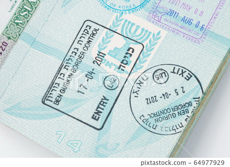 Border crossing stamps in the passport Border crossing stamps in the passport 64977929