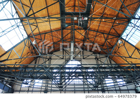 old wooden interior of industry hall 64978379