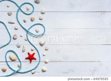 Marine items on turquoise painted wooden 64978585