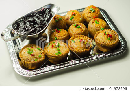 Traditional  English pork pies with cranberry 64978596