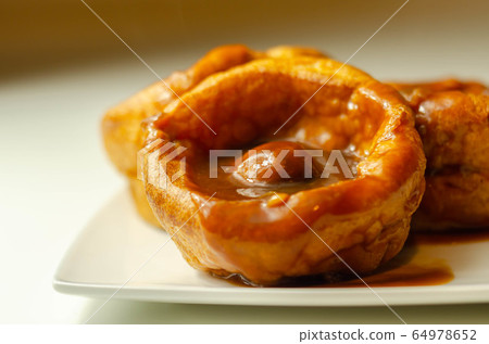 Traditional English Yorkshire pudding with Traditional English Yorkshire pudding with 64978652