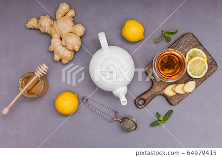 Healthy vitamin ginger tea with honey and lemon Healthy vitamin ginger tea with honey and lemon 64979415