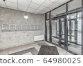 mailboxes and doors at new apartment building 64980025