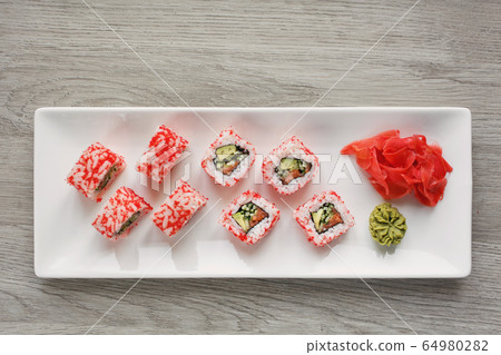 Sushi with ginger and wasabi. Sushi roll set with Sushi with ginger and wasabi. Sushi roll set with 64980282