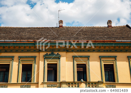 Old architecture exterior at Trg Slobode street in Novi Sad, Serbia Old architecture exterior at Trg Slobode street in Novi Sad, Serbia 64981489