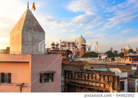 Agra deprived area and view on the Taj Mahal gate, 64982002