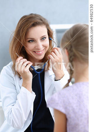 Little child at pediatrician reception 64982530