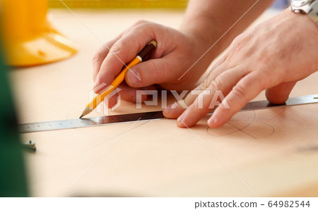 Arms of worker making structure plan 64982544