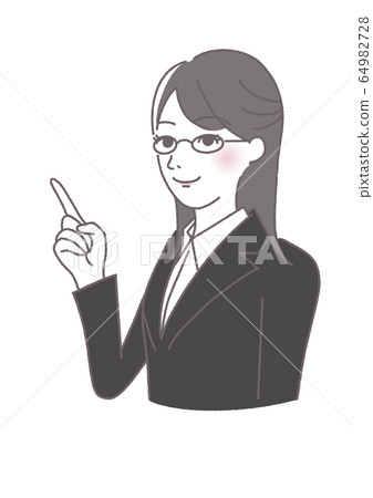 A woman in a black suit pointing A woman in a black suit pointing 64982728
