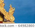The Beautiful Texture of The King of Nagas or Serpents (Giant snake) on the top of roof in public temple. 64982860