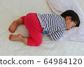 Sleeping infant prone 64984120