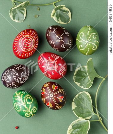 Easter eggs decorated with wax resist technique Easter eggs decorated with wax resist technique 64984959