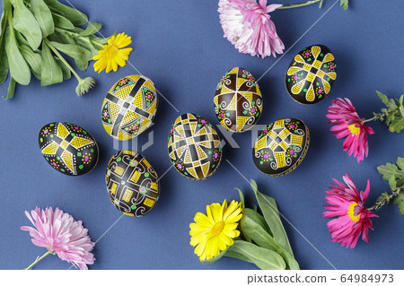 Easter eggs decorated with wax resist technique Easter eggs decorated with wax resist technique 64984973