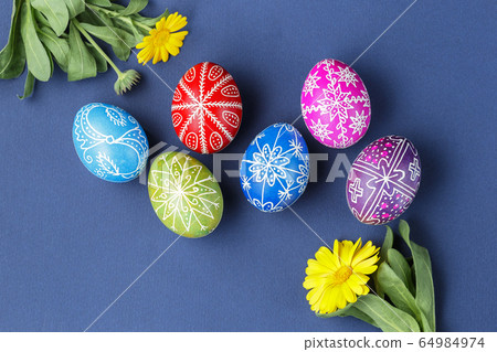 Easter eggs decorated with wax resist technique Easter eggs decorated with wax resist technique 64984974