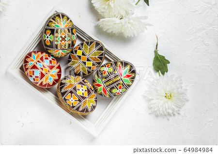 Easter eggs decorated with wax resist technique 64984984