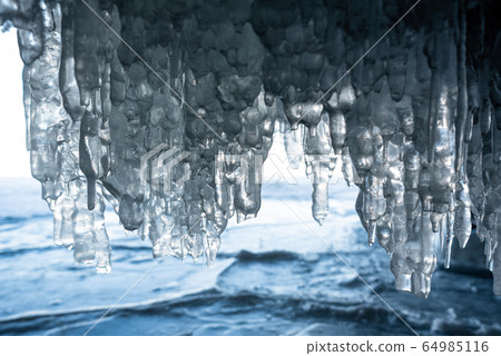 Close up Ice swag inside the cave. Lake Baikal, Russia Close up Ice swag inside the cave. Lake Baikal, Russia 64985116