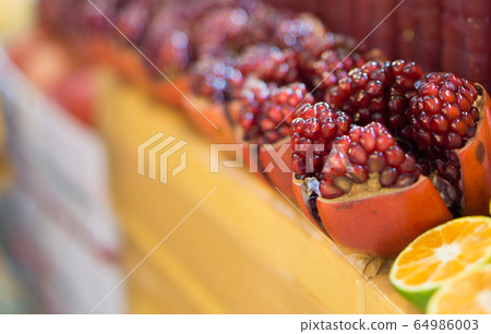 Ruby red on wooden table with selective focus. Ruby red on wooden table with selective focus. 64986003