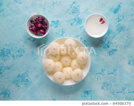 Rasgulla Bengali indian sweet dish. Top view 64986370