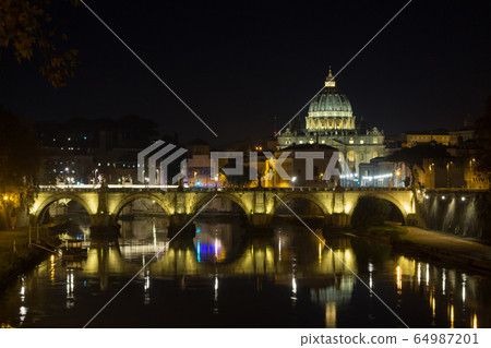 Night scene of Rome, Tevere river with basilica in 64987201