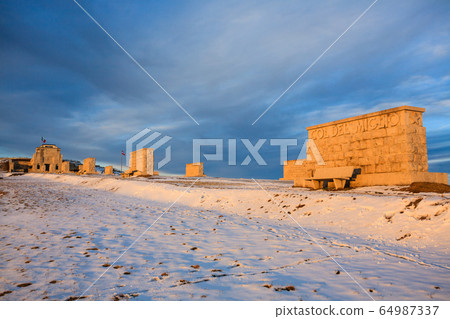 Sunset at the war memorial, Grappa mount, Italy 64987337