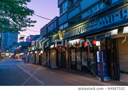Tokyo cityscape Evening view of Asakusa Hanayashiki Dori 64987582