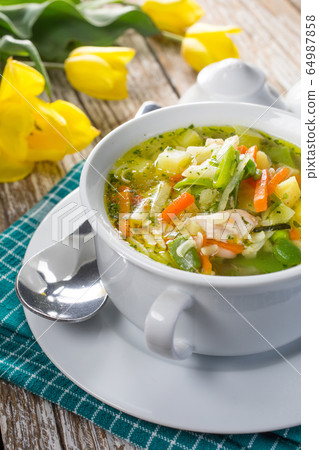 Fresh vegetable soup. Selective focus. Fresh vegetable soup. Selective focus. 64987858
