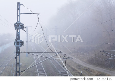 railroad rails lurking in fog railroad rails lurking in fog 64988140