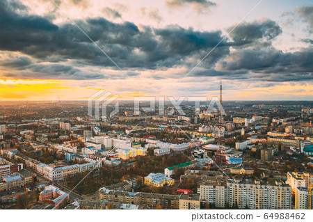 Gomel, Belarus. Aerial View Of Homiel Cityscape Skyline In Autumn Evening. Residential District During Sunset. Bird's-eye View Gomel, Belarus. Aerial View Of Homiel Cityscape Skyline In Autumn Evening. Residential District During Sunset. Bird's-eye View 64988462