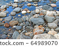 Green river stones background on white background 64989070