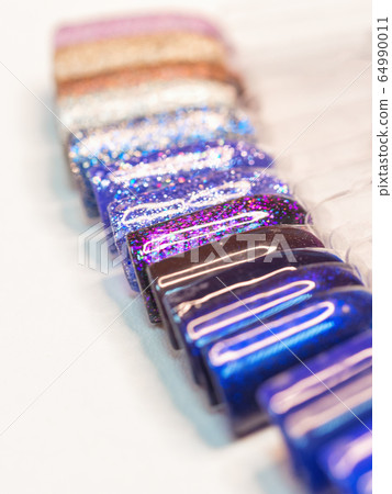 Palette with nail designs of different colors Palette with nail designs of different colors 64990011