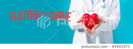 Flatten the Curve theme with a doctor holding a heart 64991975