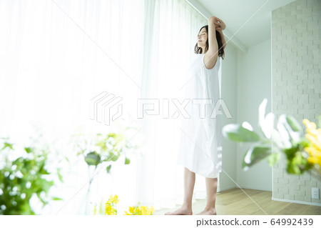 A woman growing A woman growing 64992439