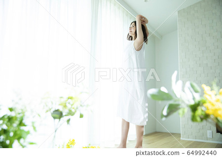 A woman growing A woman growing 64992440