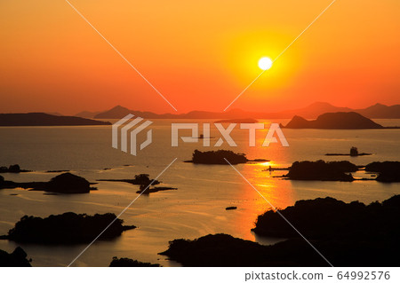 "Sasebo, Nagasaki" Exhibition Sunset and Kujukushima seen from Kaiho "Sasebo, Nagasaki" Exhibition Sunset and Kujukushima seen from Kaiho 64992576