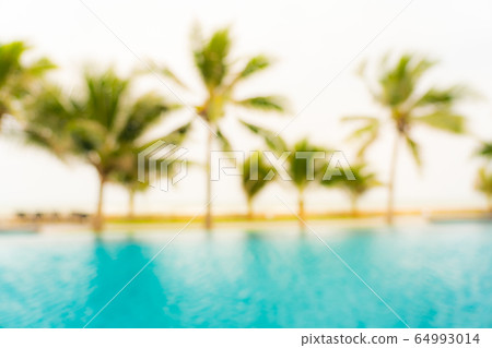 Abstract blur and defocus outdoor swimming pool in hotel resort for background Abstract blur and defocus outdoor swimming pool in hotel resort for background 64993014