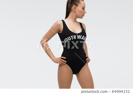 Beautiful sexy slim woman on white background Beautiful sexy slim woman on white background 64994152