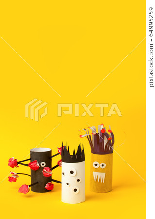 Coronavirus COVID-19 disease 2020. Paper toy monsters for Halloween party.  64995259