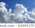 Blue sky and summer clouds 64995370
