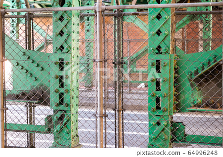 Fence under the viaduct in Shimbashi, Minato-ku, Tokyo Fence under the viaduct in Shimbashi, Minato-ku, Tokyo 64996248