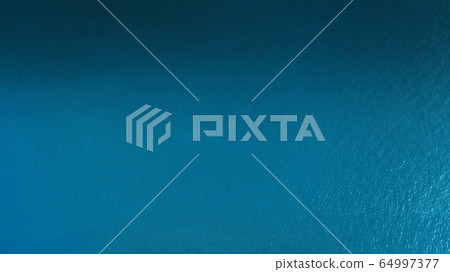 Aerial top view, Beautiful blue sea surface 64997377