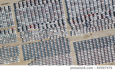 Aerial view Lot of vehicles on parking for new car 64997476