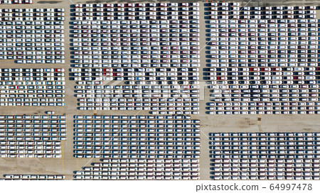 Aerial view Lot of vehicles on parking for new car Aerial view Lot of vehicles on parking for new car 64997478