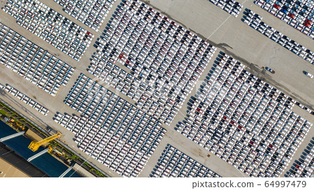 Aerial view Lot of vehicles on parking for new car Aerial view Lot of vehicles on parking for new car 64997479